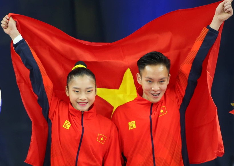 Phan Thế Gia Hiển-Bùi Minh Phương giúp Aerobic lập hat-trick huy chương Vàng. (Ảnh: Vietnam+)
