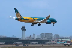 Vietnam Airlines ra mắt chiếc máy bay Boeing 787-9 Dreamliner với thiết kế đặc biệt, nổi bật hình ảnh chim Lạc. (Ảnh: PV/Vietnam+)