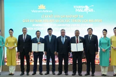 Vietnam Airlines hợp tác chiến lược với Du lịch Malaysia, quảng bá điểm đến. (Ảnh: PV/Vietnam+)