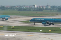 Máy bay của Vietnam Airlines tại Sân bay quốc tế Nội Bài. (Ảnh: Việt Hùng/Vietnam+)