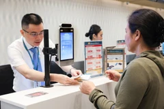 Vietnam Airlines khuyến khích hành khách làm thủ tục trực tuyến trước chuyến bay. (Ảnh: PV/Vietnam+)