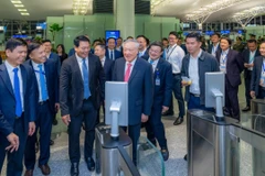 Phó Thủ tướng Thường trực Chính phủ Nguyễn Hòa Bình tham dự lễ khánh thành dự án mở rộng Nhà ga quốc tế T2 Nội Bài. (Ảnh Phan Công)