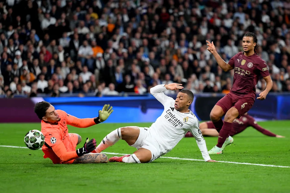 Đến phút 61, mọi chuyện càng trở nên khó khăn hơn cho Man City khi Mbappe hoàn tất hat-trick giúp Real dẫn trước 3-0. (Nguồn: Getty Images)