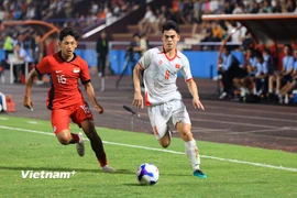 Với lợi thế sân nhà, Đội tuyển U23 Việt Nam (áo trắng) quyết tâm giành ngôi đầu bảng C - Vòng loại U23 châu Á 2026. (Ảnh: Việt Anh/Vietnam+)