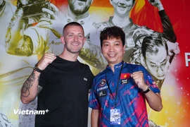 Những cơ thủ Việt Nam như Dương Quốc Hoàng (phải) sẽ so tài cùng các ngôi sao của làng Pool thế giới như Jayson Shaw (trái) tại Hanoi Open 2025. (Ảnh: Việt Anh/Vietnam+)