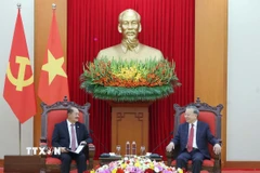 Tổng Bí thư Tô Lâm tiếp ông Kikeo Khaykhamphithoune, Uỷ viên Bộ Chính trị, Phó Thủ tướng Lào. (Ảnh: Thống Nhất/TTXVN)