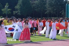 Quang cảnh lễ chào cờ khai mạc giải. (Ảnh: Đức Thắng/TTXVN)