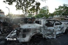 Phương tiện bị phá hủy trong xung đột giữa các tay súng bộ lạc ở thành phố Sweida, miền Bắc Syria ngày 17/7/2025. (Nguồn: THX/TTXVN)