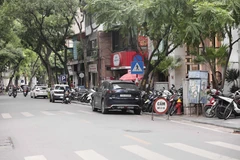 Một điểm trông giữ xe ở Hà Nội. (Ảnh: Thành Phương/TTXVN)