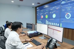 Trung tâm giám sát, điều hành thông minh (IOC) thành phố Đà Nẵng triển khai chia sẻ dữ liệu đến các phường, xã. (Ảnh: Mỹ Hà/TTXVN)