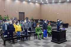 Sáng 10/3, Tòa án nhân dân thành phố Hà Nội mở phiên tòa xét xử sơ thẩm 8 bị cáo trong vụ cháy tòa nhà chung cư mini cao 9 tầng trên phố Khương Hạ (phường Khương Đình, quận Thanh Xuân, Hà Nội) khiến 56 người tử vong, 44 người bị thương vào đêm 12/9/2023. (Ảnh: Phạm Kiên/TTXVN)