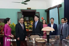 Chủ tịch nước Lương Cường tham quan Di tích Nhà 67 ở Khu Di tích Chủ tịch Hồ Chí Minh trong Phủ Chủ tịch. (Ảnh: Lâm Khánh/TTXVN)