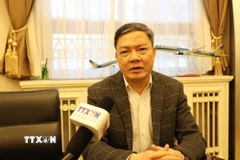 Tham tán Thương mại Việt Nam tại Trung Quốc Nông Đức Lai trả lời phỏng vấn phóng viên TTXVN tại Bắc Kinh. (Ảnh: Công Tuyên/TTXVn)