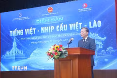 Đại sứ Việt Nam tại Lào Nguyễn Minh Tâm phát biểu tại Diễn đàn "Tiếng Việt: Nhịp cầu Việt-Lào." (Ảnh: Xuân Tú/TTXVN)