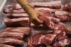 Trung Quốc sẽ áp dụng mức thuế sơ bộ từ 15,6-62,4% đối với các lô hàng thịt lợn nhập khẩu từ EU. (Nguồn: AFP)