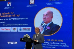 Ông Vũ Bá Phú, Cục trưởng Cục Xúc tiến thương mại (Bộ Công Thương), phát biểu tại Hội thảo. (Ảnh: Uyên Hương/TTXVN)