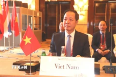 Phó Viện trưởng Viện Kiểm sát Nhân dân tối cao Việt Nam Trần Hải Quân tại lễ khai mạc hội nghị. (Ảnh: Xuân Vịnh/TTXVN)