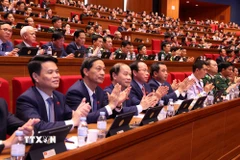 Các đại biểu dự phiên thảo luận tại hội trường về các văn kiện Đại hội XIV của Đảng chiều 21/1. (Ảnh: TTXVN)