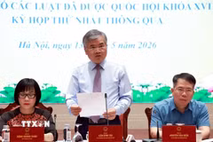 Phó Chủ nhiệm Văn phòng Chủ tịch nước Cấn Văn Tài chủ trì họp báo. (Ảnh: Tuấn Anh/TTXVN)