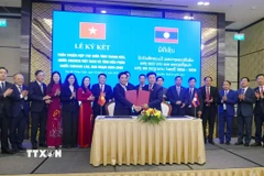 Quang cảnh lễ ký kết. (Ảnh: Xuân Tú/TTXVN)