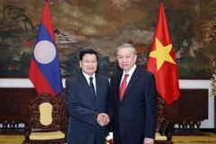 Tổng Bí thư Tô Lâm hội kiến Tổng Bí thư, Chủ tịch nước Lào Thongloun Sisoulith. (Ảnh: Thống Nhất/TTXVN)