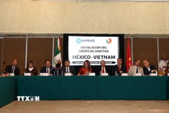 Lễ ký các văn bản liên quan đến việc thành lập Nhóm nghị sỹ hữu nghị Mexico-Việt Nam. (Ảnh: Phi Hùng/TTXVN)