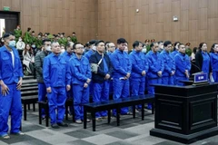 Các bị cáo tại phiên tòa sáng 15/12. (Nguồn: Báo Thanh tra)