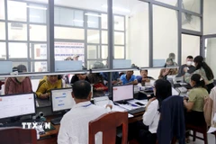 Hoạt động tại Trung tâm phục vụ hành chính công xã Bắc Bình (Lâm Đồng). (Ảnh: Hồng Hiếu/TTXVN)