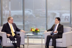 Chủ tịch nước Lương Cường tiếp Phó Thống đốc bang Washington Denny Heck. (Ảnh: Lâm Khánh/TTXVN)