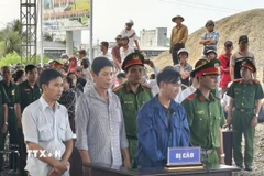 Các bị cáo tại phiên xét xử ngày 12/11/2025. (Ảnh: Tuấn Kiệt/TTXVN)