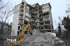 Tòa nhà bị phá hủy sau cuộc không kích tại Tehran, Iran, ngày 23/3/2026. (Ảnh: THX/TTXVN)