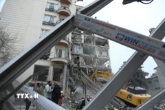 Tòa nhà bị phá hủy sau cuộc không kích tại Tehran, Iran, ngày 23/3/2026. (Ảnh: THX/TTXVN)