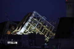 Hiện trường vụ sập tháp nhà máy nhiệt điện ở Ulsan, Hàn Quốc. (Nguồn: Yonhap/TTXVN)