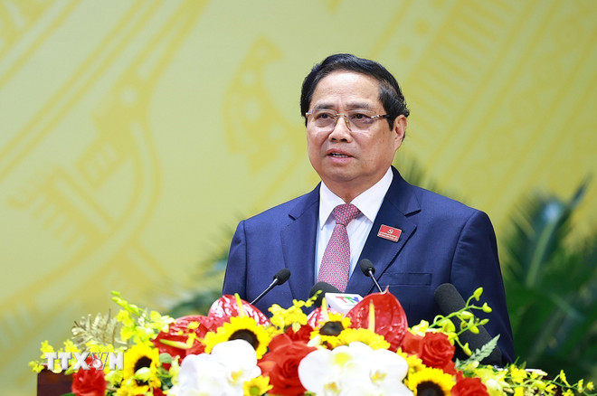 នាយករដ្ឋមន្ត្រីថ្លែងសុន្ទរកថានៅមហាសន្និបាតបក្សខេត្ត Thanh Hoa លើកទី២០។ (រូបថត៖ Duong Giang/VNA) ttxvn-thu-tuong-pham-minh-chinh-du-dai-hoi-dai-bieu-dang-bo-tinh-thanh-hoa-lan-thu-20-8339605-3.jpg