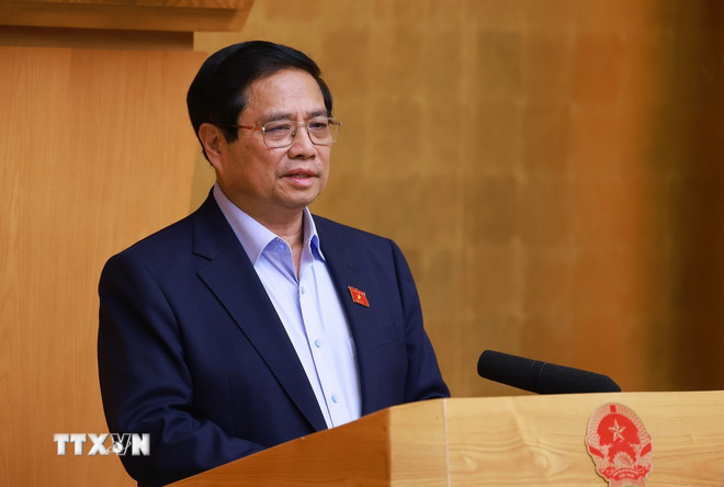 Thủ tướng: Bố trí kinh phí trả cho người xin nghỉ và dôi dư khi sắp xếp bộ máy ttxvn-thu-tuong-pham-minh-chinh-chu-tri-cuoc-hop-chinh-phu-chuyen-de-ve-viec-sap-xep-don-vi-hanh-chinh-cac-cap-8021733-6.jpg