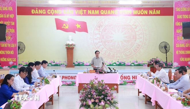 ttxvn-thu-tuong-kiem-tra-mo-hinh-chinh-quyen-dia-phuong-2-cap-tai-dong-thap-8162086.jpg
