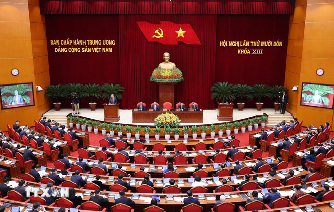 ເປີດກອງປະຊຸມໃຫຍ່ຄັ້ງທີ 14 ຂອງສູນກາງພັກຊຸດທີ 13. (ພາບ: ລຳຄານ/VNA) ttxvn-khai-mac-hoi-nghi-trung-uong.jpg