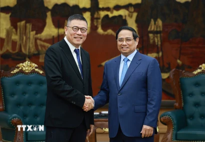 Thủ tướng Phạm Minh Chính tiếp ông Hồng Thiên Chúc, Chủ tịch Tập đoàn Texhong (Trung Quốc). (Ảnh: Dương Giang/TTXVN)