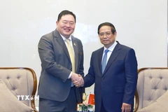 Thủ tướng Phạm Minh Chính tiếp ông Thammasak Sethaudom, Chủ tịch kiêm Giám đốc điều hành của Tập đoàn SCG (Thái Lan). (Ảnh: Dương Giang/TTXVN)