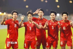 Các cầu thủ U23 Việt Nam ăn mừng bàn thắng mở tỷ số của Quốc Việt vào lưới U23 Hàn Quốc trong trận tranh hạng ba Vòng Chung kết U23 châu Á, tối 23/1/2026. (Ảnh: AFC/TTXVN)