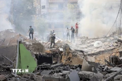 Tòa nhà bị phá hủy sau cuộc không kích của Israel tại Beirut (Liban). (Ảnh: THX/TTXVN)
