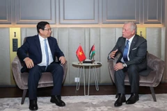 ThủThủ tướng Phạm Minh Chính gặp Quốc vương Jordan Abdullah II bin Al-Hussein. (Ảnh: Dương Giang/TTXVN)