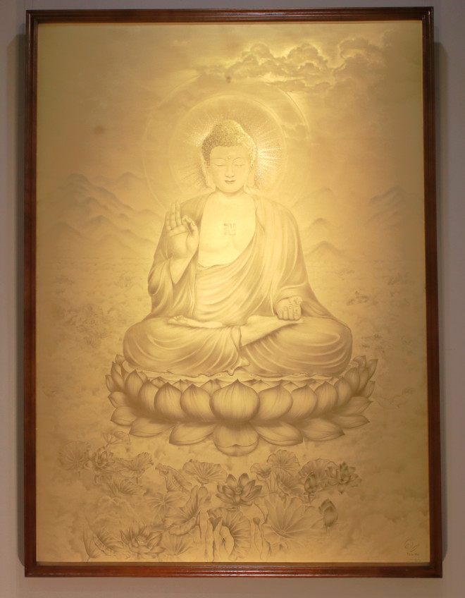 Et portrett av Buddha laget av gull på et maleri av Thien Hai. (Foto: Minh Anh/Vietnam+) img-6889.jpg