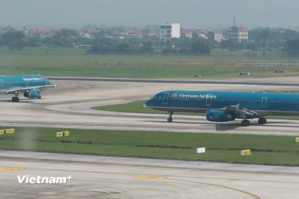 Máy bay của Vietnam Airlines tại Sân bay quốc tế Nội Bài. (Ảnh: Việt Hùng/Vietnam+)