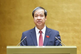 Bộ trưởng Bộ Giáo dục và Đào tạo Nguyễn Kim Sơn trình bày tờ trình. (Ảnh: Doãn Tấn/TTXVN)