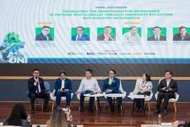 Các đại biểu phát biểu tại hội thảo. (Ảnh: PV/Vietnam+)