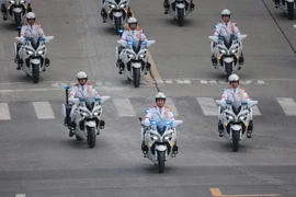 Khối xe bảo vệ, hộ tổng lãnh đạo Đảng và các đoàn khách quốc tế. (Ảnh: Hoài Nam/Vietnam+)