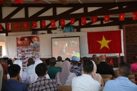 Các đại biểu cùng nghe phát biểu của Tổng Bí thư Tô Lâm tại lễ kỷ niệm 80 năm Quốc khánh Việt Nam. (Ảnh: Huyền Anh/Vietnam+)