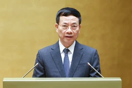 Bộ trưởng Bộ Khoa học và Công nghệ Nguyễn Mạnh Hùng trình bày tờ trình dự án Luật Trí tuệ nhân tạo. (Ảnh: Doãn Tấn/TTXVN)