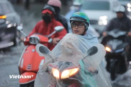 Hà Nội ngập nhiều tuyến phố vì bão Bualoi. (Ảnh: Hoài Nam/Vietnam+)